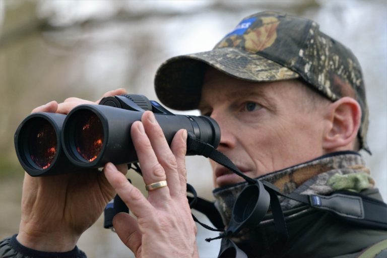 Hunter with binoculars