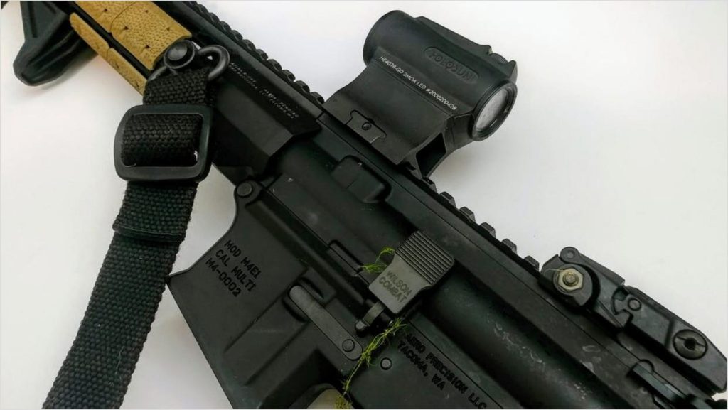 Example of a gold dot sight mounted on a carbine platform