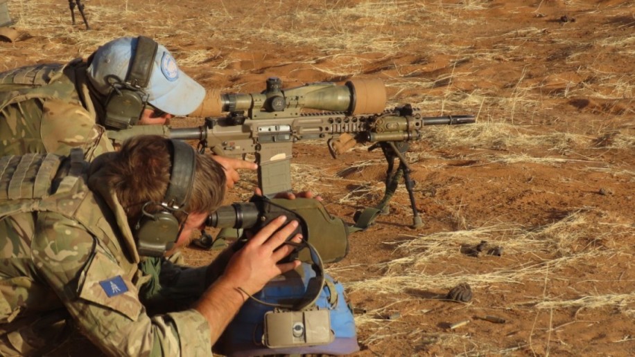 Using a spotting scope in conjunction with a sniper rifle