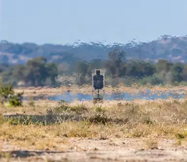 Heat shimmer affecting long-distance visibility on a sunny outdoor range