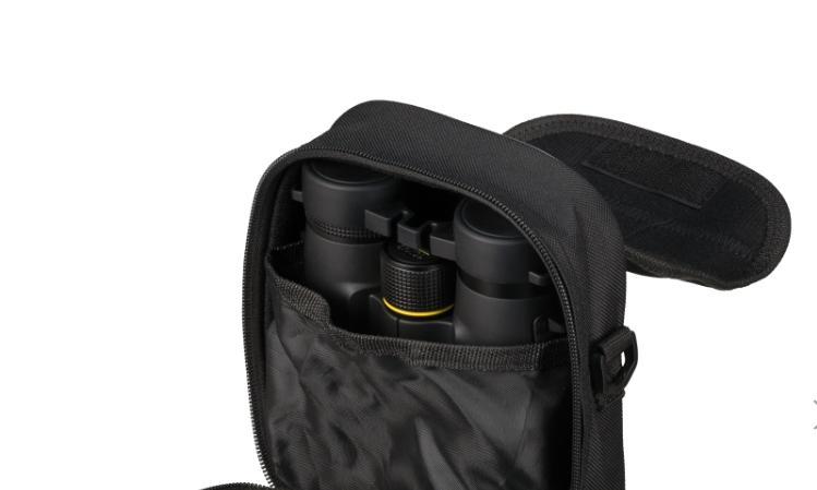 The eyecups focusing wheel and textured grip of an 8×42 body